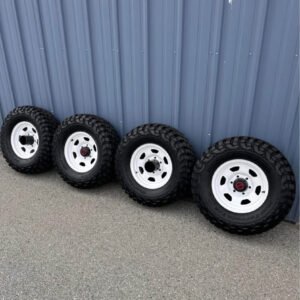 OEM Toyota Pickup 4x4 Steel Wheels Set (1979–1983) w/ BFGoodrich KM3 Mud-Terrain Tires
